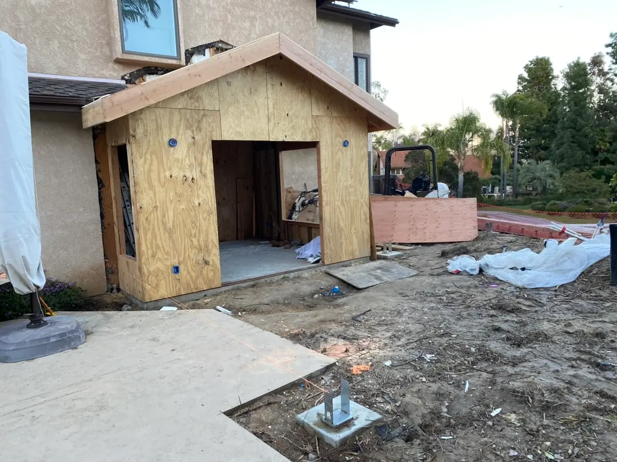 New structure framed and sheathed on its footings in Encinitas