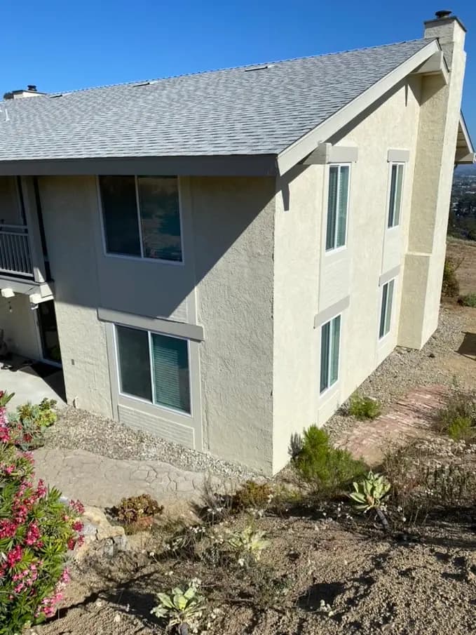 New window trim and siding on an Escondido home exterior