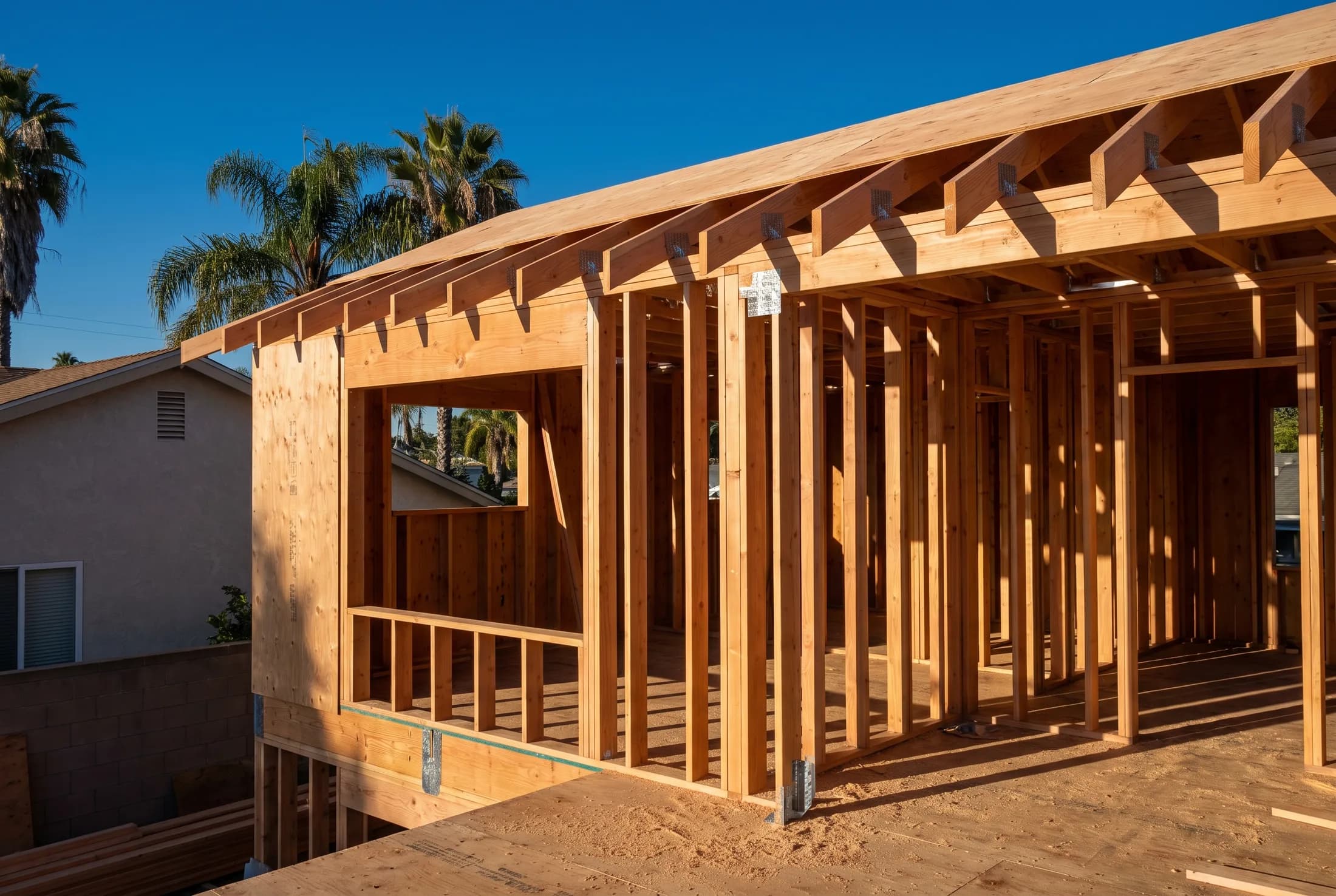 New Douglas fir framing standing open on a rural property in Fallbrook, California