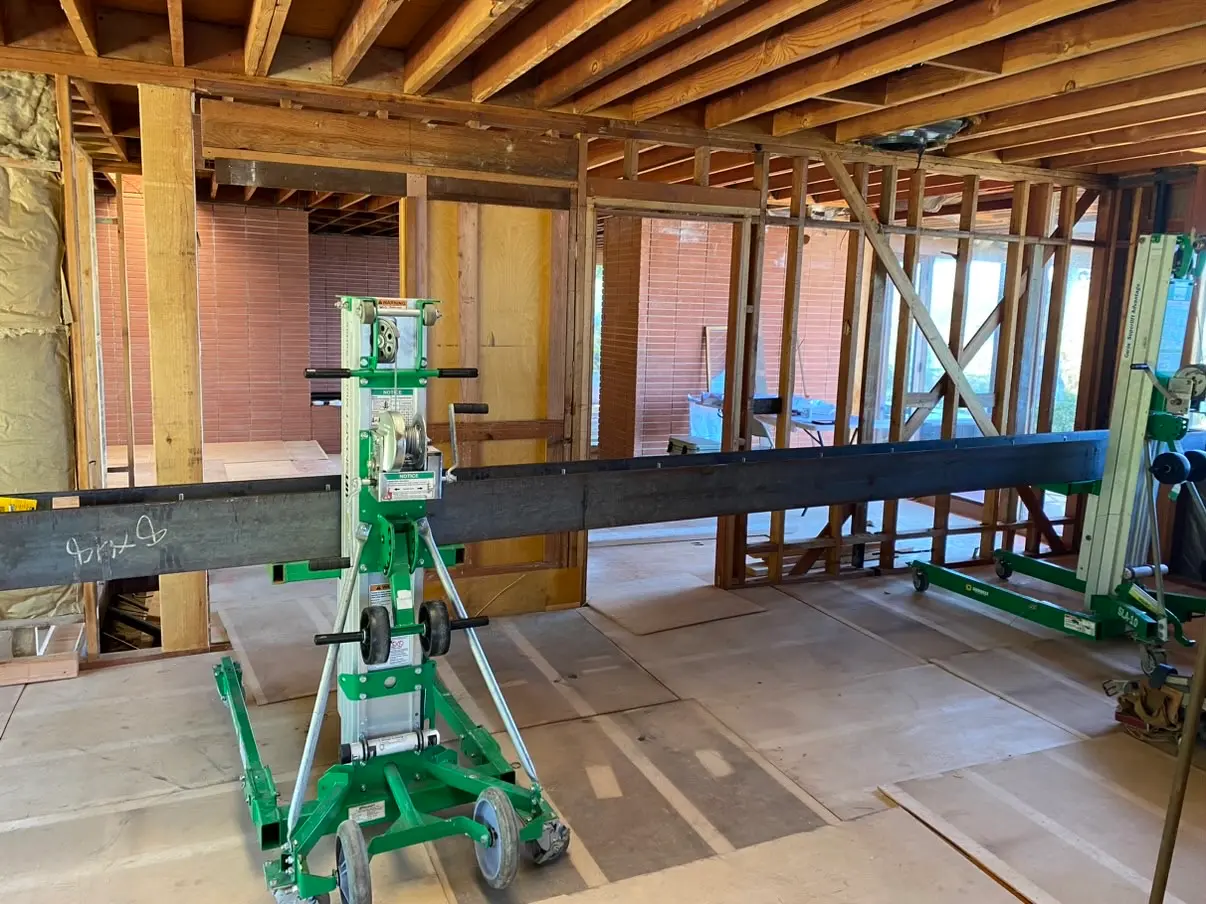 Steel beam set and columns shored during a historic La Jolla structural remodel