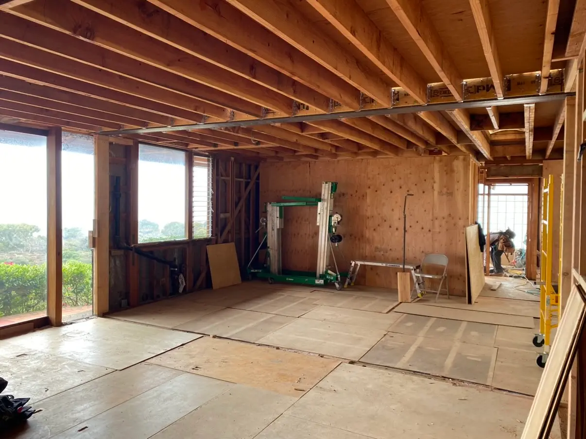 Interior stripped to the studs with a new steel beam carrying the ceiling in La Jolla