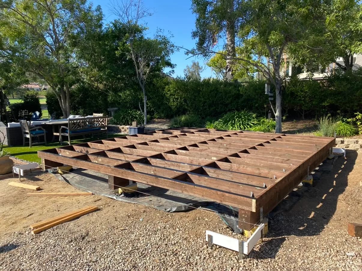 Finished deck and pavilion stepping down to the lawn in Rancho Bernardo