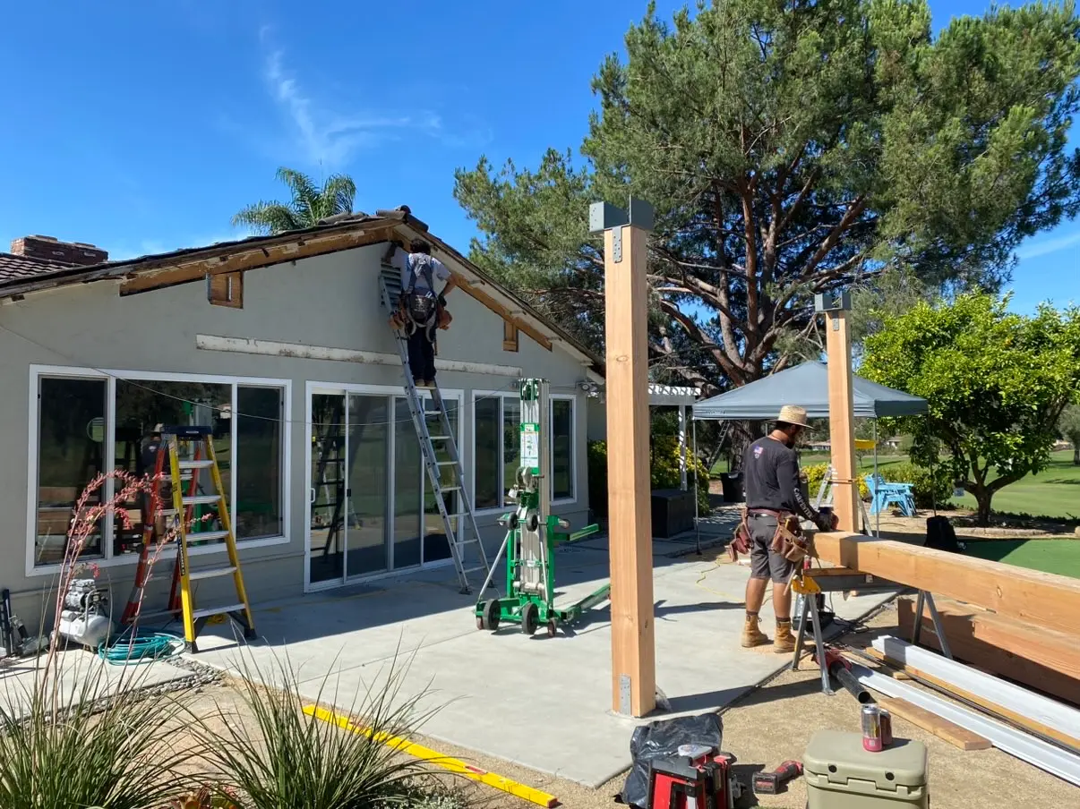 Timber structure standing with temporary bracing before the roof goes on